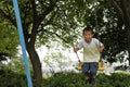 Japanese boy on the swing Royalty Free Stock Photo