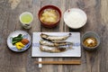 traditional Japanese breakfast set meal grilled fish, rice, miso soup, Natto, and pickles. Royalty Free Stock Photo