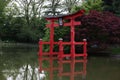 Japanese Brooklyn botanical garden with a small lake and red torii Royalty Free Stock Photo