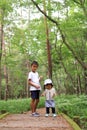 Japanese brother and sister on a hike Royalty Free Stock Photo