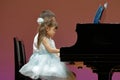 Japanese brother and sister playing piano on stage Royalty Free Stock Photo