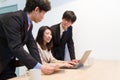 Japanese business person looking at internet contents on PC
