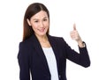 Japanese business woman going thumb up