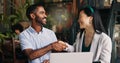 Japanese business woman, man and handshake by laptop, talking and tablet with deal, advice and finance startup. Person Royalty Free Stock Photo