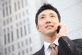 Japanese businessman talks with a mobile phone Royalty Free Stock Photo