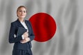 Japanese businesswoman on the flag of Japan digital nomad, business, startup concept