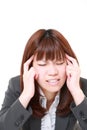 Japanese businesswoman suffers from headache