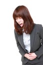 Japanese businesswoman suffers from stomachache