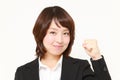 Japanese businesswoman in a victory pose