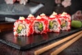 Japanese California Roll with eel, avocado, cucumber, cream with Philadelphia cheese, tobiko caviar and Japanese mayonnaise Sushi Royalty Free Stock Photo