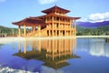 Japanese castle with shadow on water in Hinoki land