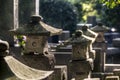 Japanese cemetery with stone lanterns Royalty Free Stock Photo