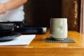 Japanese ceramic cup of green tea on wooden table Royalty Free Stock Photo