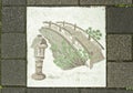 Japanese ceramic tile decorated with stone lantern, wooden bridg