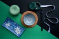 Japanese or Chinese table setting with traditional table mat and dinnerware with green and black background. Royalty Free Stock Photo