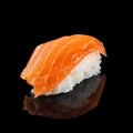 Japanese classic sushi nigiri with salmon isolated on black back Royalty Free Stock Photo