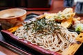 Japanese cold soba noodle on bamboo plate with Shrimp and vegetable tempura