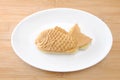 Japanese confectionery taiyaki fish cake wagashi on plate on table Royalty Free Stock Photo