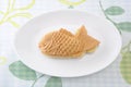 Japanese confectionery taiyaki fish pancake wagashi on plate on table Royalty Free Stock Photo