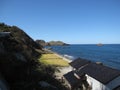 Japanese countryside rocky coast seaside with building and fields Royalty Free Stock Photo