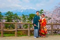 Japanese couple attend a Japanese traditional wedding ceremony at Hirosaki Park Royalty Free Stock Photo