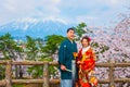 Japanese couple attend a Japanese traditional wedding ceremony at Hirosaki Park Royalty Free Stock Photo