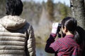 Japanese couple, bird watching hobby, Royalty Free Stock Photo