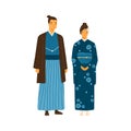 Japanese couple wearing traditional costumes. Man and woman in decorated national clothes yukata and hakama. Young