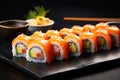 Japanese cuisine. Salmon sushi roll on a stone plate. Royalty Free Stock Photo