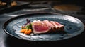 Japanese cuisine. Seared tuna on a ceramic plate Royalty Free Stock Photo