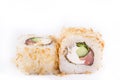 Japanese Cuisine, Sushi Set: roll with shavings of tuna, smoked salmon, cream cheese, green onions, cucumber on a white background Royalty Free Stock Photo