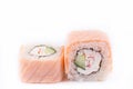 Japanese Cuisine, Sushi Set: salmon roll with cheese, cucumber and crab meat on a white background Royalty Free Stock Photo