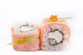 Japanese Cuisine, Sushi Set: salmon roll with cheese and cucumber on a white background Royalty Free Stock Photo