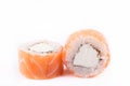 Japanese Cuisine, Sushi Set: salmon roll with cheese on a white background. Royalty Free Stock Photo