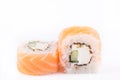 Japanese Cuisine, Sushi Set: salmon roll with cucumber and cheese on a white background. Royalty Free Stock Photo