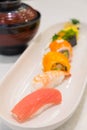 Japanese cuisine. sushi set served on white plate.