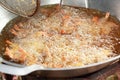 Japanese Cuisine - Tempura Shrimps fried in a pan. Royalty Free Stock Photo