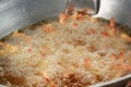 Japanese Cuisine - Tempura Shrimps fried in a pan. Royalty Free Stock Photo