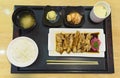 Japanese cuisine, Teriyaki chicken served with rice, miso soup, Chawanmushi and salad on wooden table Royalty Free Stock Photo
