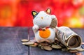 Japanese currency with lucky cat