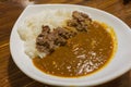 Japanese curry with rice topped with beef and onion simmered in a mildly sweet sauce flavored Royalty Free Stock Photo