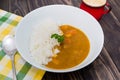 Japanese curry rice on vintage wooden table Royalty Free Stock Photo