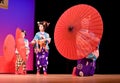 Japanese dancers with umbrellas Royalty Free Stock Photo