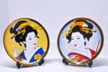 Japanese decorative plates featuring Japanese women Royalty Free Stock Photo