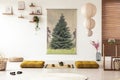 Japanese dining room interior with a tree poster, lamp, pillows