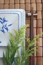 Japanese dish & chopstick on bamboo mat