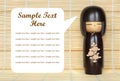 Japanese doll on bamboo mat