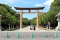 Japanese family taking photo in front of Entrance torii gate of Kashihara Jingu Temple Royalty Free Stock Photo