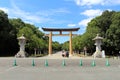 Japanese family taking photo in front of Entrance torii gate of Kashihara Jingu Temple Royalty Free Stock Photo