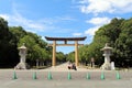 Japanese family taking photo in front of Entrance torii gate of Kashihara Jingu Temple Royalty Free Stock Photo